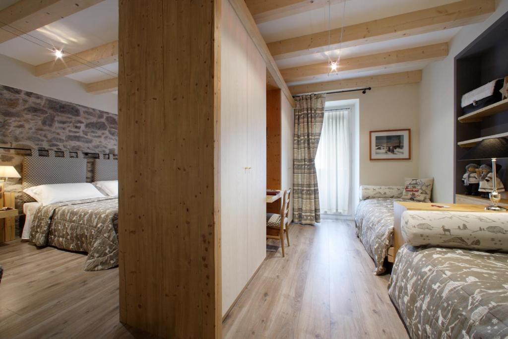 Hotel Savoia Dal 1924 San Martino Di Castrozza Rom bilde